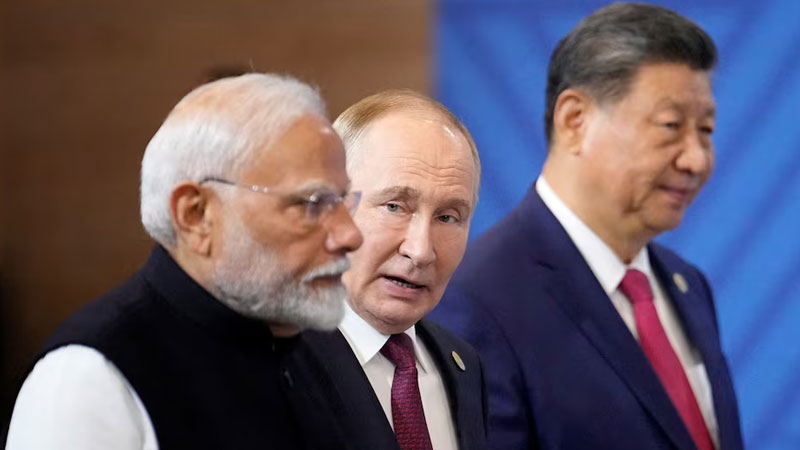 With Modi and Putin, China Stages a Show of Strength: Reuters 15 Last year in Kazan Russia Indian Prime Minister Narendra Modi Russian President Vladimir Putin and Chinese President Xi Jinping shared the stage at the BRICS summit