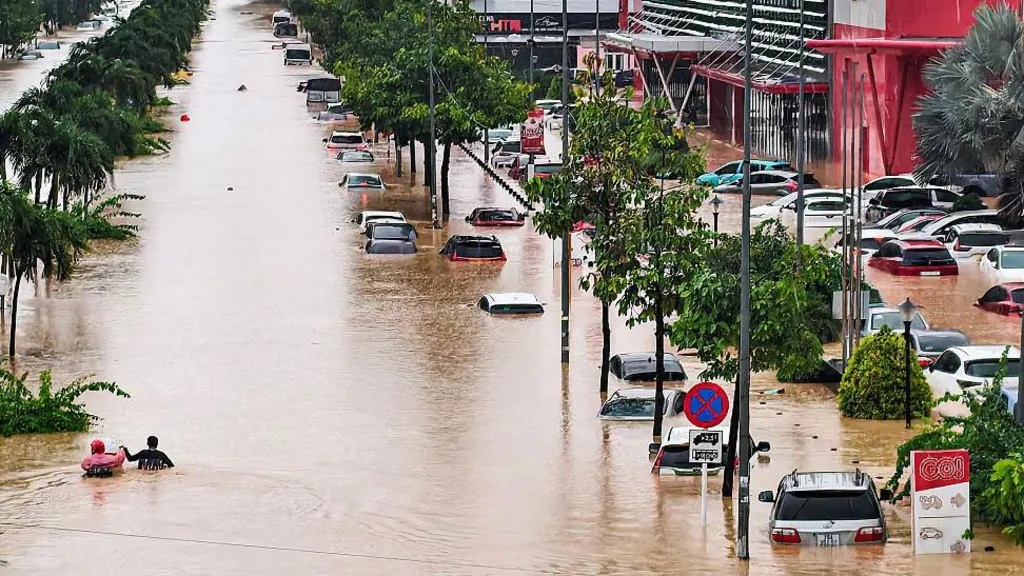 The deluge has submerged more than 52000 homes and left half a million households and businesses without power