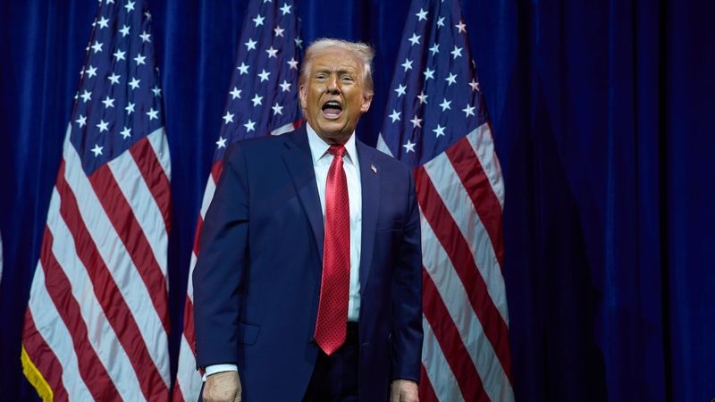 President Donald Trump walks off stage after speaking to House Republican lawmakers during their annual policy retreat.